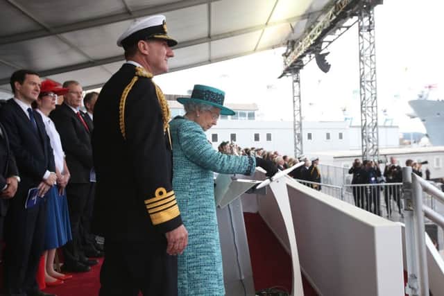 The Queen formally names the Royal Navy's biggest ever ship, HMS Queen Elizabeth.