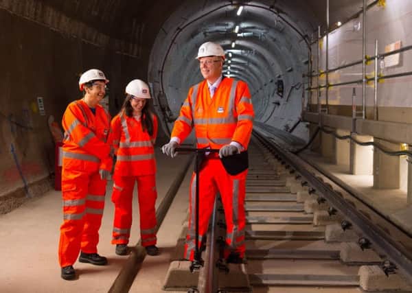 transport Secretary Chris Grayling inspects London's new Crossrail line.