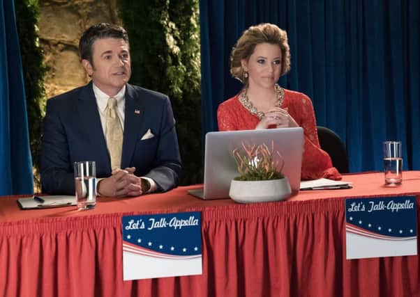 OUT OF TUNE: John Michael Higgins and Elizabeth Banks in Pitch Perfect 3.