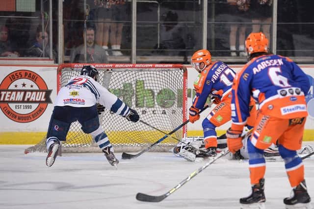 Miika Franssila scores Sheffield Steelers' first goal against Dundee in the Challenge Cup quarter-final second leg. Steelers won 6-1 on the night, 13-3 overall. 
Picture: Dean Woolley.
December 19, 2019.