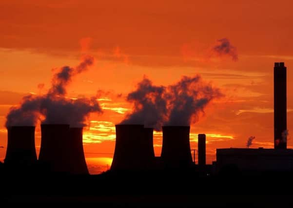 The sun sets behind Drax Power Station.
