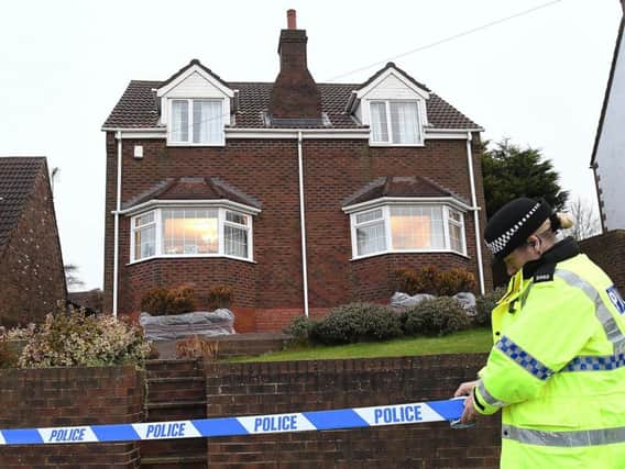 Police cordon off the house