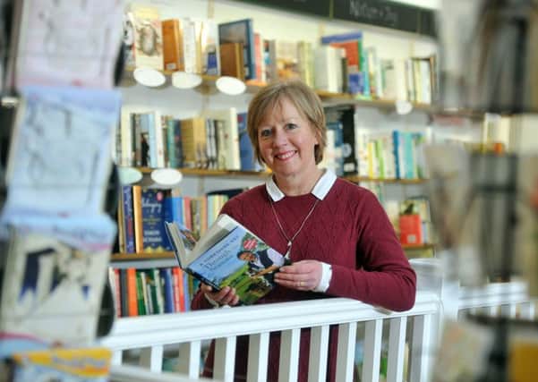 Sue Lake, owner of White Rose Book Cafe in Thirsk, has seen great benefits for her business and the local community from The Yorkshire Vet's TV success. Picture by Tony Johnson.