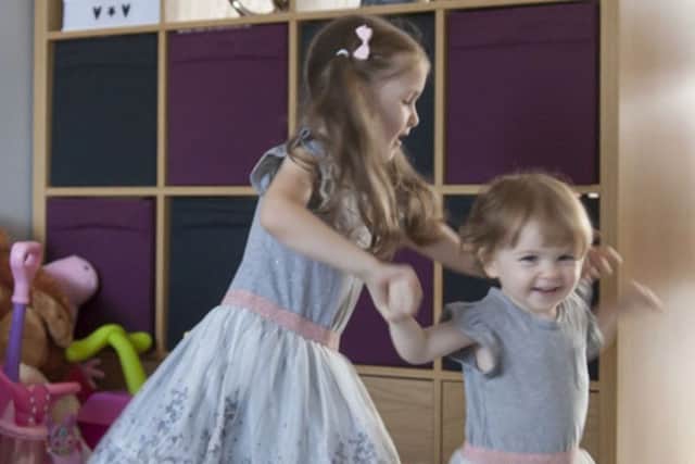 Amy and Mia Parr who both could not move from the head down when they were born due to an extremely rare neurological condition beat the odds by walking for the first time.