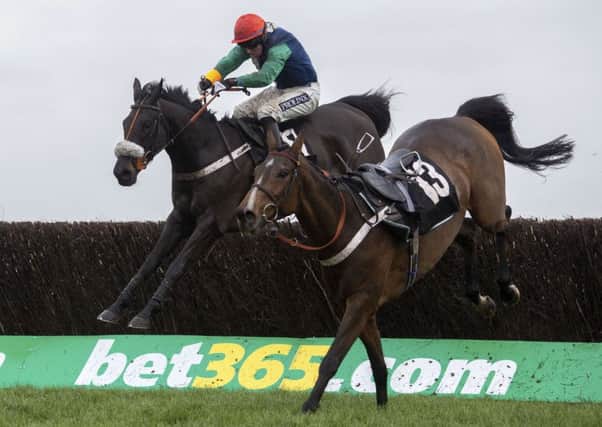 Aloomomo  - ridden by Gavin Sheehan - avoids a loose horse to win at Newbury two years ago. The horse is on track for Wetherby's Rowland Meyrick Chase on Boxing Day.