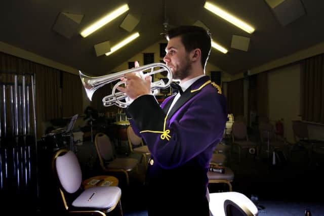 See brass bands competing in March. Picture: Lorne Campbell / Guzelian

Cornet player Sam Gibson rehearses in the band room of the world famous Brighouse and Rastrick Brass Band. It is 40 years since the West Yorkshire band,  made it to number two in the charts with `The Floral Dance'. The song was further popularised when Terry Wogan added his singing to the tune. 
PICTURE TAKEN ON MONDAY 20 MARCH  2017
WORDS BY GUZELIAN

A conductor who helped resurrect a popular 1911 song by Katie Moss and turned it into a chart hit will perform with former members of his brass band to celebrate 40 years since its success. 

Derek Broadbent, of Bradford, West Yorkshire, is responsible for the Brighouse & Rastrick Band's arrangement of The Floral Dance, which charted in at number two back in December 1977.

Mr Broadbent will be reuniting with his former players and current members of the band on Saturday, March 25, at Huddersfield Town Hall, to conduct a special concert to celebrate the 40th anniversary of the hit.