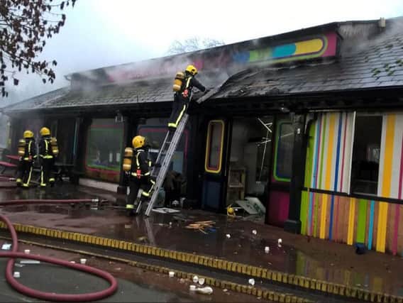 Firefighters work at London Zoo