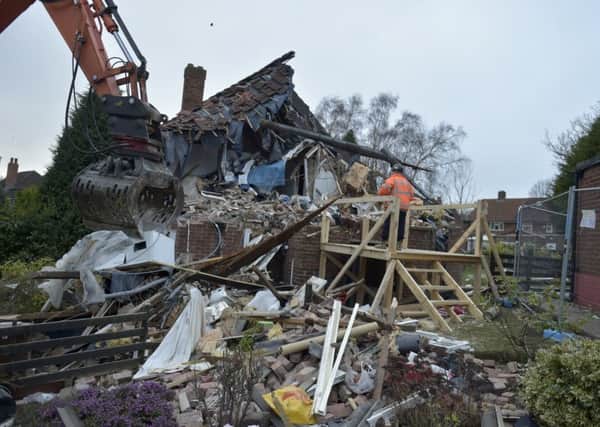 Demolition work is carried out at the home in Silk Mill Drive, Tinshill. Picture: Steve Riding