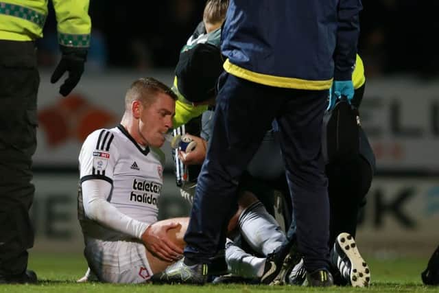 Sheffield United's Paul Coutts is given gas and air after suffering a broken leg at Burton Albion last month. Picture: Simon Bellis/Sportimage
