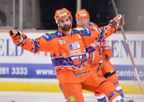 Mathieu Roy celebrates his empty-net strike against Braehead Clan. Picture: Dean Woolley