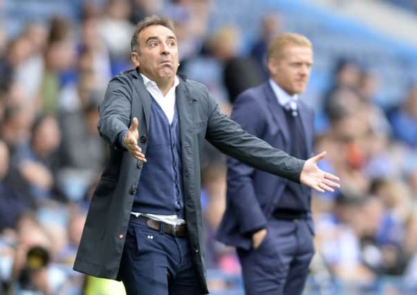 Middlesbrough manager Garry Monk, right, was sacked despite his side winning at Sheffield Wednesday on Saturday  a result that saw Owls boss Carlos Carvalhal, left, leave his club yesterday.