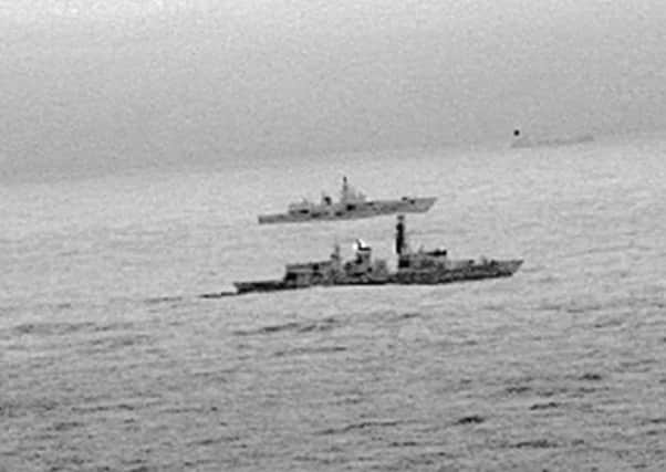 Handout photo issued by the Ministry of Defence of Royal Navy frigate HMS St Albans escorting a Russian warship through the North Sea and areas of UK interest on Christmas Day.