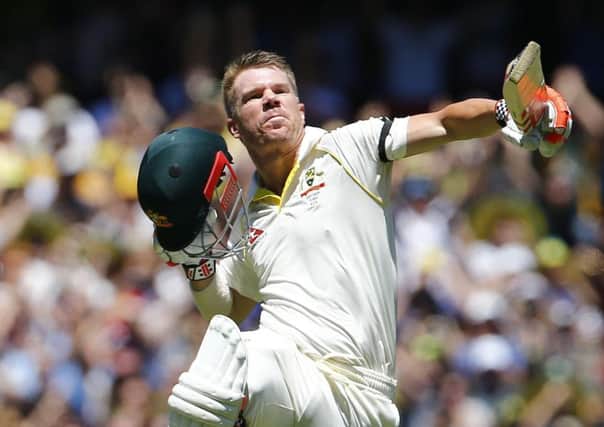 Australia's David Warner celebrates his century during day one of the Ashes Test match at the Melbourne Circket Ground, Melbourne. (Picture: Jason O'Brien/PA Wire)
