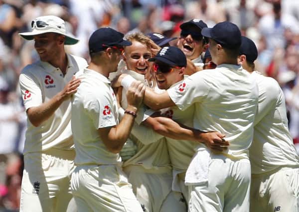 England's Tom Curran celebrates prematurely after he took the wicket of Australia's David Warner which was  overturned due to a no ball during day one of the Ashes Test match at the Melbourne Circket Ground, Melbourne. (Picture: Jason O'Brien/PA Wire)