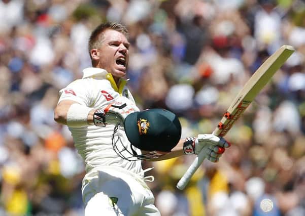Australia's David Warner celebrates his century during day one of the Ashes Test match at the Melbourne Cricket Ground, Melbourne. (Picture: Jason O'Brien/PA Wire)