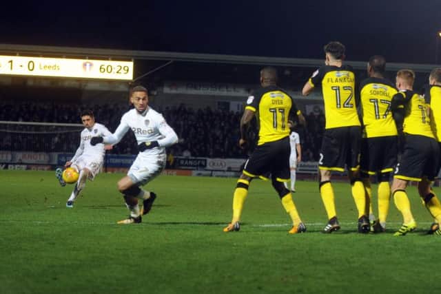 Pablo Hernandez scores a magnificent equaliser for Leeds United, curling a free-kick around the defensive wall, and they went on to win 2-1 at Burton Albion (Picture: Tony Johnson).