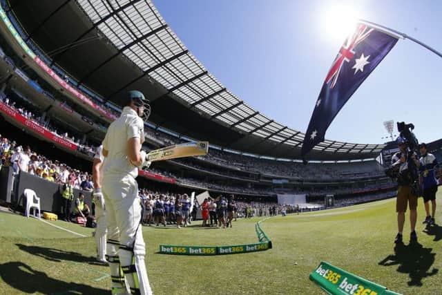 Australia's Steve Smith prepares to enter the field of play on day two at the MCG. Picture: Jason O'Brien/PA