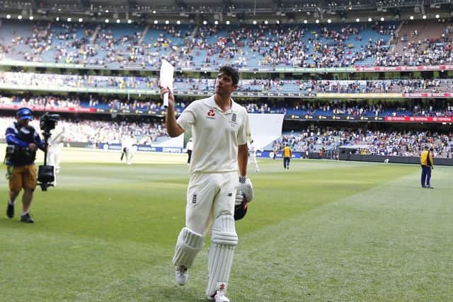 BACK ON TOP: England's Alastair Cook acknowledges the crowd after his century at the close of play on day two in Melbourne. Picture: Jason O'Brien/PA