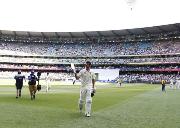 England's Alastair Cook acknowledges the crowd after his century at the close of play on day two at the MCG in Melbourne. Picture: Jason O'Brien/PA
