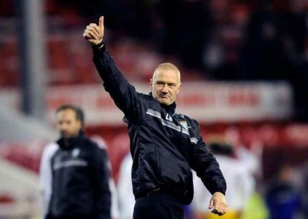 In with a shout: Lee Bullen gives a thumbs up to fans after Sheffield Wednesday's victory over Nottingham Forest.