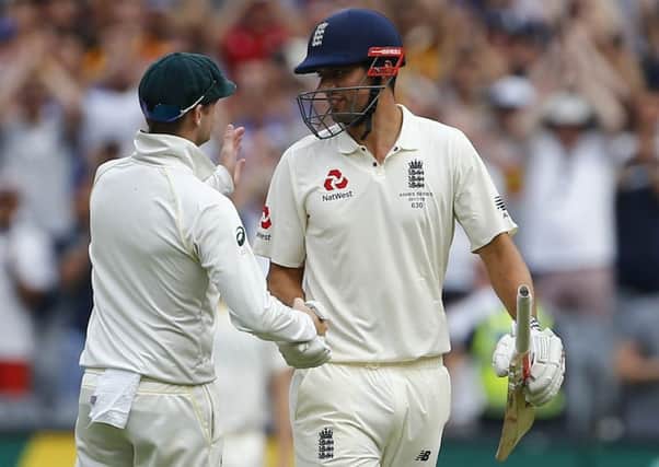 Well done: England's Alastair Cook is congratulated by Steve Smith after making a double century.