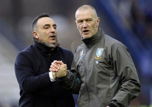 Carlos Carvalhal, left, alongside his assistant Lee Bullen while at Sheffield Wednesday. Carvalhal is now in charge of Swansea and Bullen is caretaker manager of the Owls.