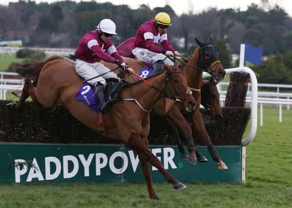 Road To Respect ridden by Sean Flanagan (right) clears the last on the way to winning the Leopardstown Christmas Chase. Picture: Brian Lawless/PA Wire