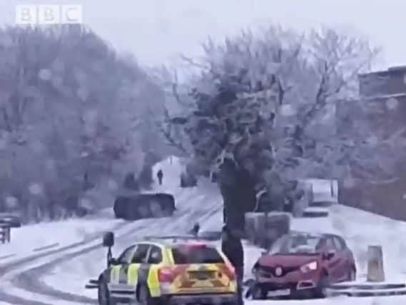 The moment the car overturned. Pic and video by @OliConstable / BBC Radio Sheffield