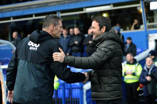 HELLO THERE: Leeds United's head coach Thomas Christiansen is welcomed by Birmingham City manager Steve Cotterill.