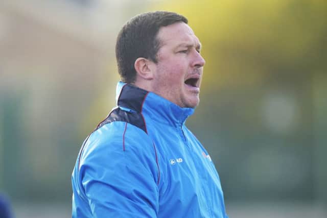 FRUSTRATED: 
Guiseley manager Paul Cox