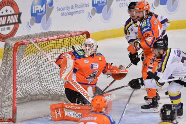 MIND THE NET: Ervins Mustukovs makes one of the 28 saves he had to make against Manchester on Saturday night at Sheffield Arena. Picture: Dean Woolley