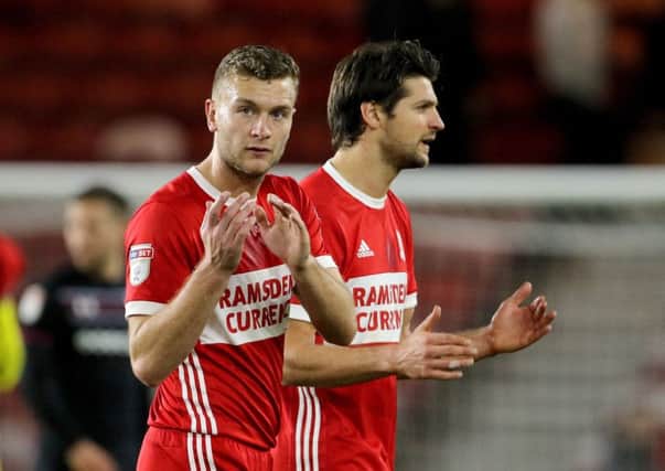 Middlesbrough's Ben Gibson (left) and Middlesbrough's George Friend