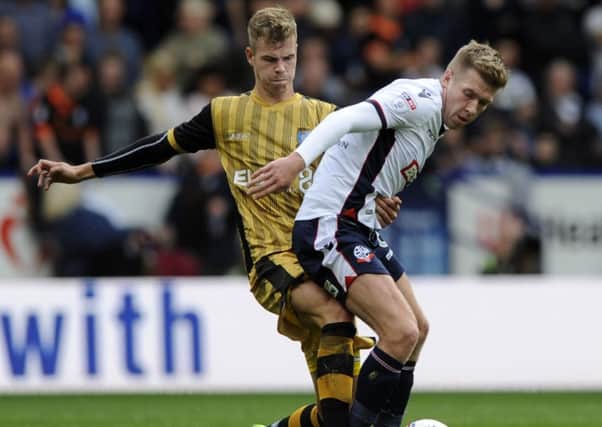 Bolton's Josh Vela, playing against the Owls, is wanted by Sheffield Wednesday and Leeds United (Picture: Steve Ellis)