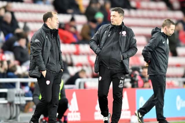 WINNING RETURN: Barnsley manager Paul Heckingbottom, right, chats to Jamie Clapham on the touchline. Picture: Frank Reid/Johnston Press.