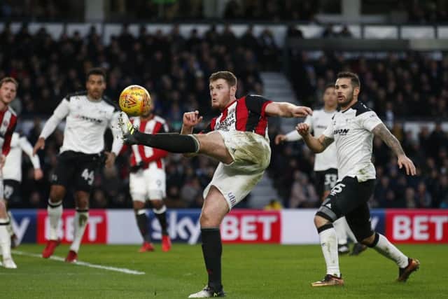Sheffield United's Jack O'Connell crosses the ball into the box at Pride Park. Picture: Simon Bellis/Sportimage