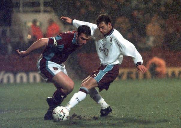 Flashback: West Ham United's David Unsworth, left, and Emley's Deiniol Graham fight for the ball. Picture: Sean Dempsey/PA