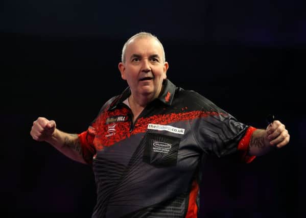 Phil Taylor has bowed out of the sport of darts after defeat in the world final.