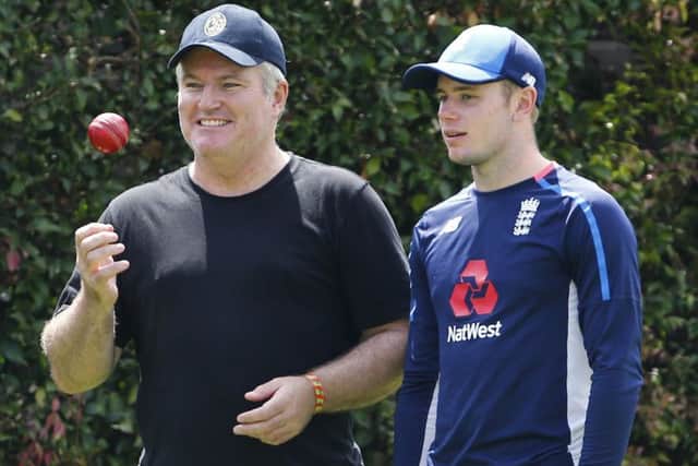 England's Mason Crane chats with spin consultant Stuart Macgill  during a nets session at Sydney Cricket Ground.
