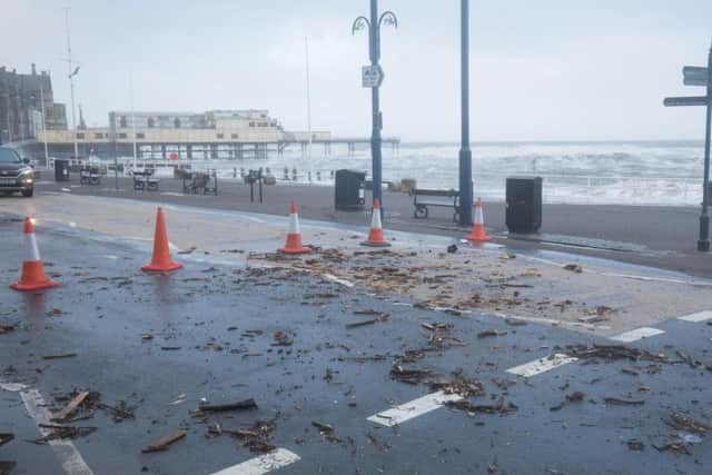 Debris caused by waves crashing over the sea wall in Aberystwyth in west Wales as Storm Eleanor lashed the UK with violent storm-force winds of up to 100mph, leaving thousands of homes without power and hitting transport links. PA