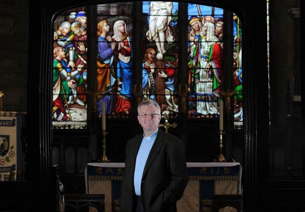 Rev Tim Gill is vicar of St Mary's Church, Ecclesfield in Sheffield, a Grade I listed building that has received a grant of Â£220,000 from the Heritage Lottery Fund for major repairs. Picture: Scott Merrylees