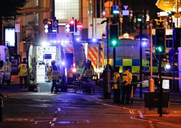 Emergency services at the scene of the Manchester bombing.