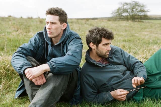 Josh O'Connor (left) as Johnny Saxby and Alec Secareanu as Gheorghe Ionescu in God's Own Country