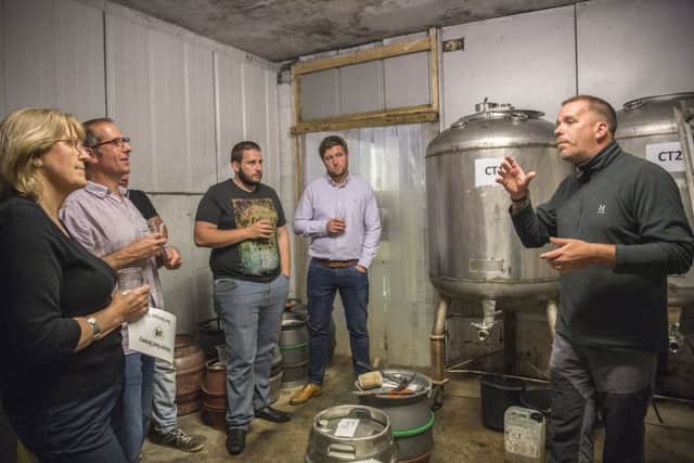 One of the tour parties being talked through the finer arts of craft ale brewing.