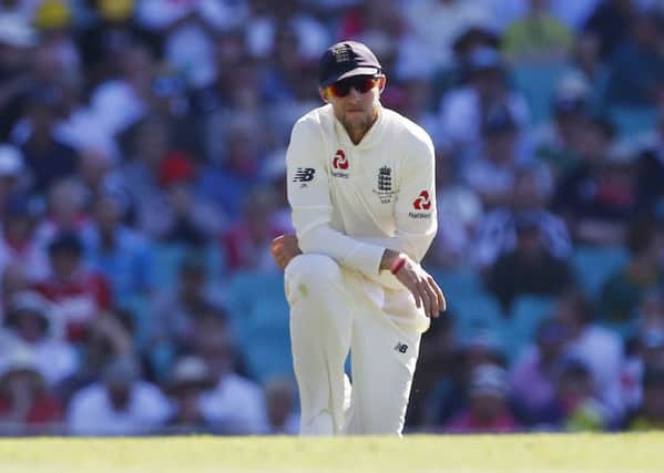 England captain Joe Root shows his frustration in the field  during day two at the SCG. Picture: Jason O'Brien/PA