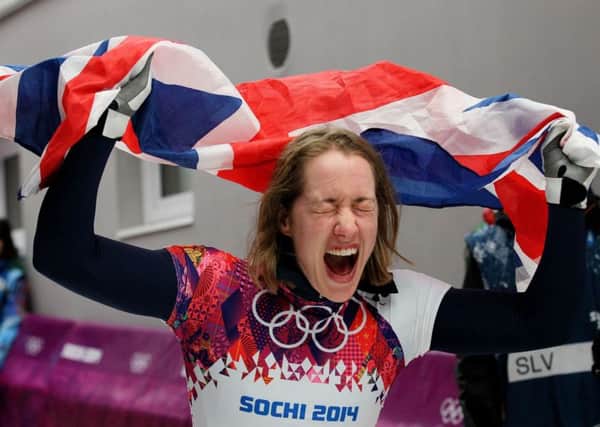 Lizzy Yarnold celebrated winning Gold in the Women's Skeleton at the 2014 Sochi Olympics. Picture: Andrew Milligan/PA