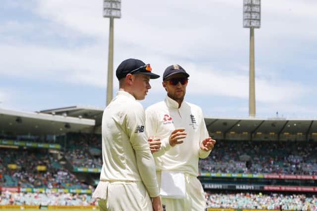 BIG MATCH NERVES: England's Joe Root talks with Mason Crane on day two of the fifth Ashes Test at the SCG. Picture: Jason O'Brien/PA