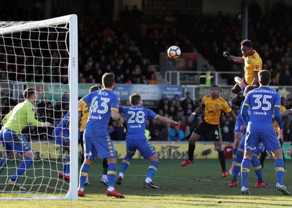 KILLER BLOW: Newport County's Shawn McCoulsky scores his side's winning goal at Rodney Parade. Picture: David Davies/PA