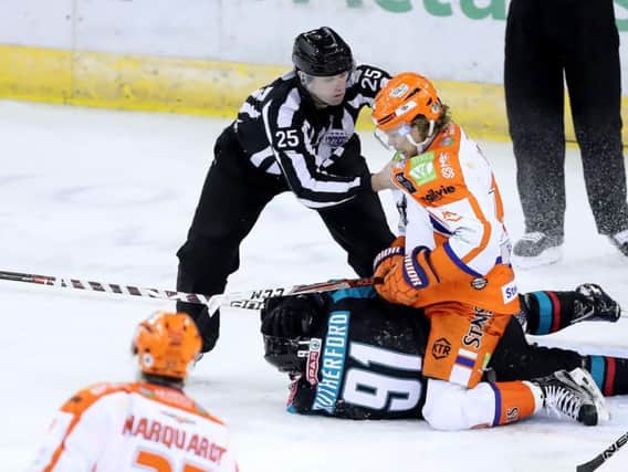 FLASHPOINT: Andrews Jamtin gets to grips with Belfast Giants' David Rutherford during Saturday's 5-1 defeat at the SSE Arena. Picture: Picture: Press Eye/Darren Kidd/EIHL.