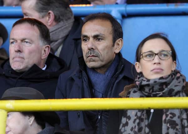 New Sheffield Wednesday manager Jos Luhukay, centre, watches from the stands during Saturday's FA Cup tie at Carlisle United (Picture: Steve Ellis).