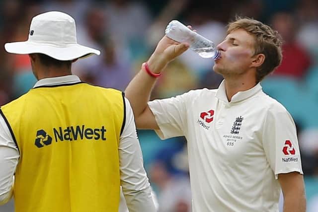 Illness-hit: England captain Joe Root takes a drink before having to retire again.